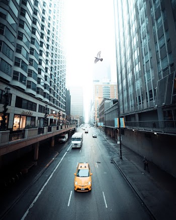 Yellow Car In the Middle Of The Road 
