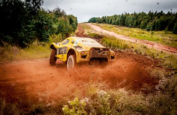 Yellow Car On Mud