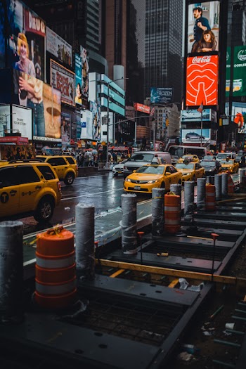 Yellow Cars On Asphalt Road