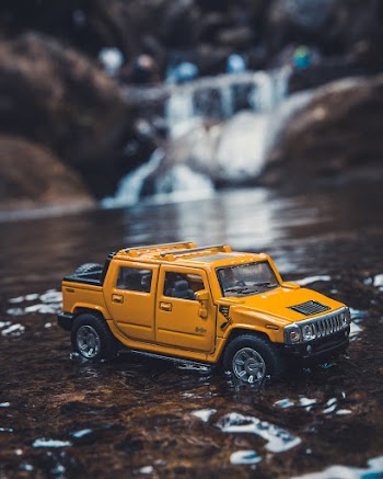 Yellow Hummer Suv Scale Model on River