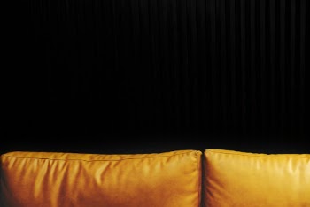 Yellow Leather Cushions With Black Background