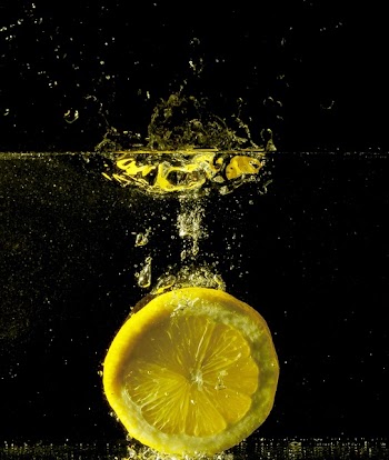Yellow Lime Submerged in Water