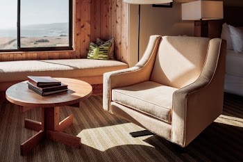 yellow padded armchair