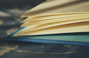 Yellow Pages of Book With Blue Cover
