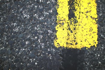 Yellow Painted Gray Road