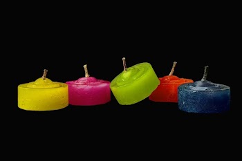 Yellow Pink Green and Blue Candle