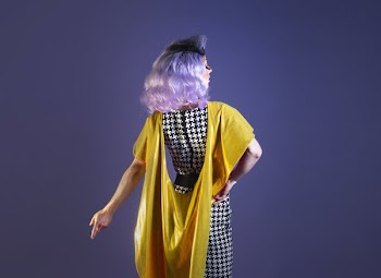 Yellow Shawl Draped On Drag Performer