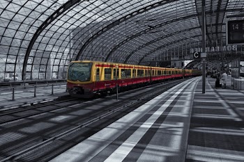 Yellow Train on Railway during Daytime