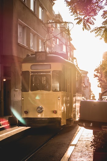 Yellow Tram Beside the Road