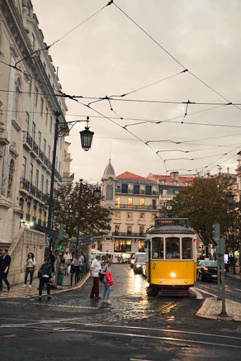 Yellow Tram in City Street