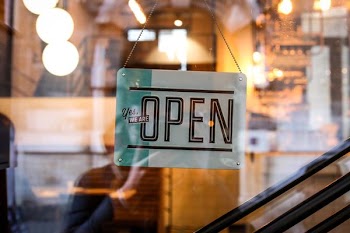 Yes, We're Open sigange