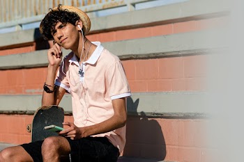 Young adult listen to music, at a skatepark… | Free stock photo | High Resolution image