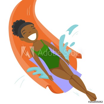 Young african-american woman riding down a waterslide with splash at the aquapark