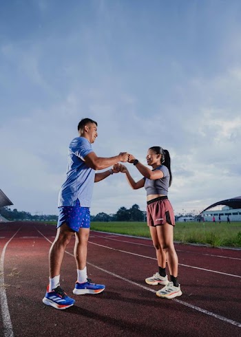 Young Athletes Celebrating a Relay Race Victory