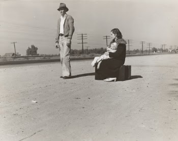 Young family, penniless, hitchhiking on U.S. Highway 99, California. The father, twenty-four, and the mother, seventeen, came from Winston-Salem, North Carolina, early in 1935
Photographer Dorothea Lange
