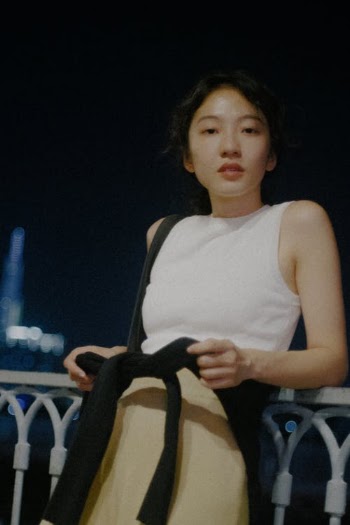 Young Girl In The City Of Light · Free Stock Photo