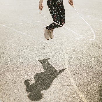 Young girl jumping rope, summer | Free Photo - rawpixel