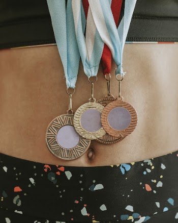 Young gymnast with many medals | Free Photo - rawpixel