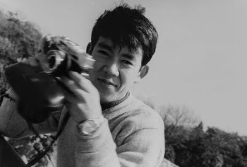 Young Man Holding Camera · Free Stock Photo