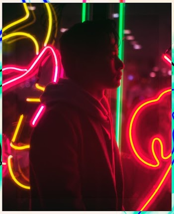 Young Man In Neon Lights