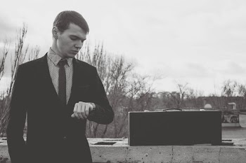 Young Man Standing Against Sky