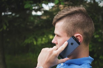 Young man talking on the phone 3