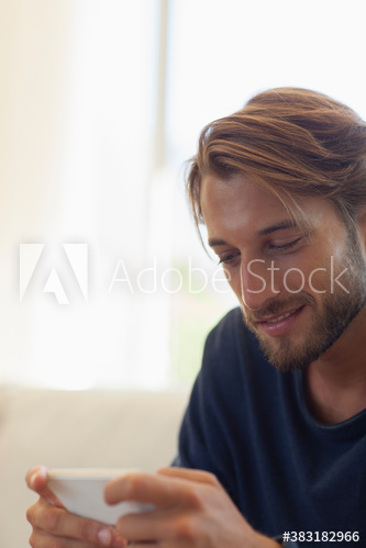 Young man using smart phone