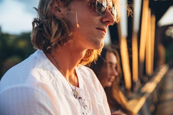 Young Man Watches Sunset