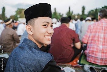 young people smile happily at Eid al-Fitr prayers, celebrate Eid al-Fitr together
