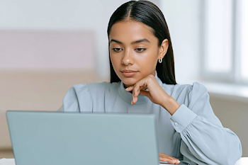 Young Professional Woman Working at Modern Desk