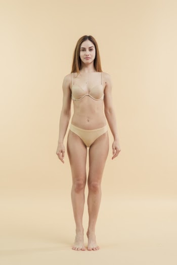 Young smiling redhead woman posing in underclothing Free Photo