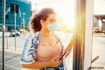 Young woman doing online payment with smartphone
