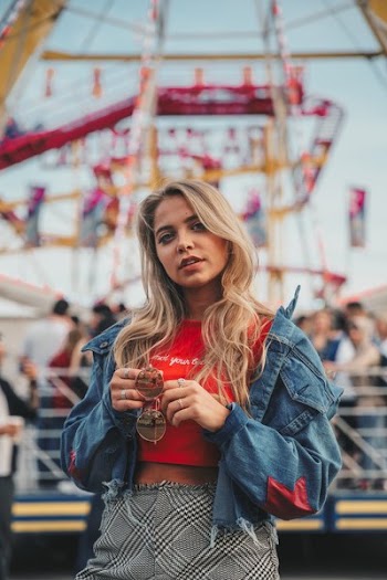 Young Woman Posing At Carnival