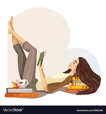 young woman reads a book on couch at cosy home