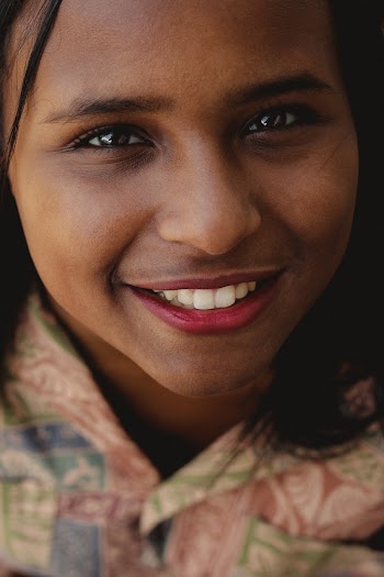 Young Woman Taking a Selfie Wearing A Printed Collared Top