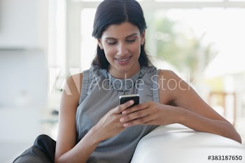 Young woman using smart phone