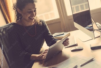 Young Woman Working at Home, Small Office