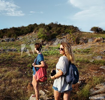 Young Women Travel Together Concept
