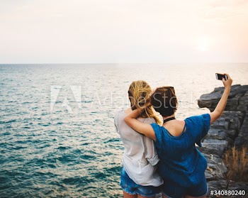 Young Women Travel Together Concept