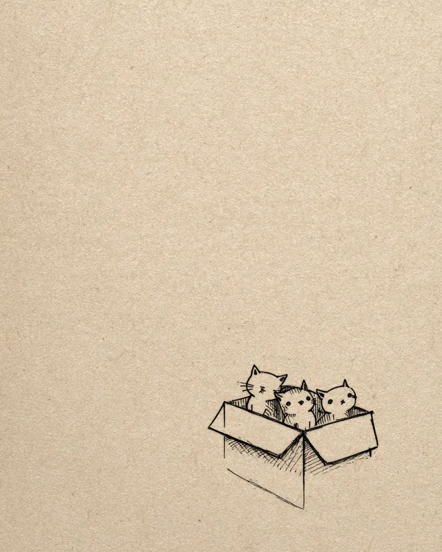 Adorable Cats Peeking from Box