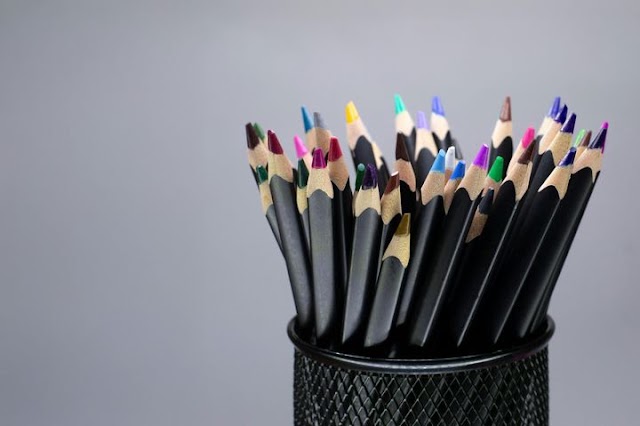 Colorful Assortment of Sharp Colored Pencils in a Black Holder