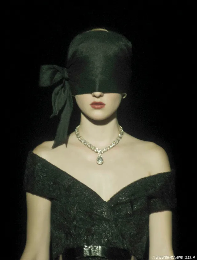 Elegant Model in Black Veil at Fashion Week