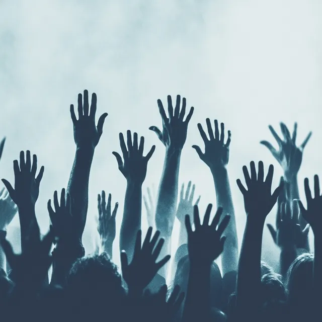 Free: Festival crowd with hands raised in the air, vibrant LED stage ...